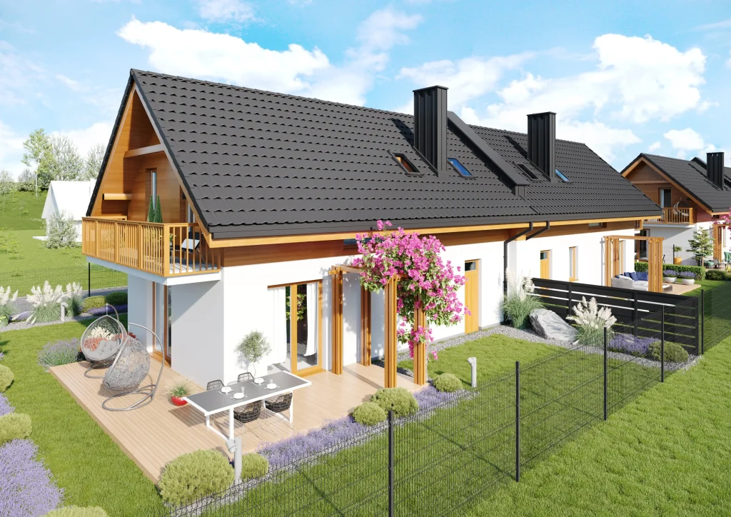 Domy w Mnikowie – ogród z tarasem, pergolą i kwitnącą roślinnością przy zabudowie bliźniaczej